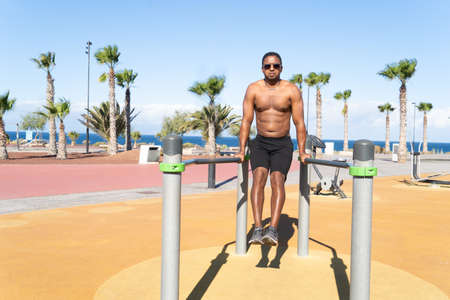 sport training - workout of athletic build man outdoor