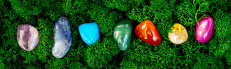 Healing crystals set rainbow on brown background, magic healing Rock for Reiki Crystal Ritual, Witchcraft, spiritual esoteric practiceの写真素材