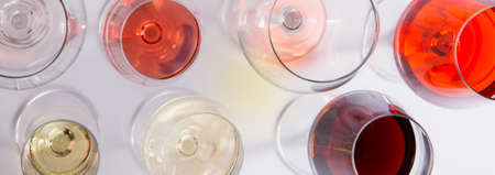 Set of glasses with red, white and rose wine, top view