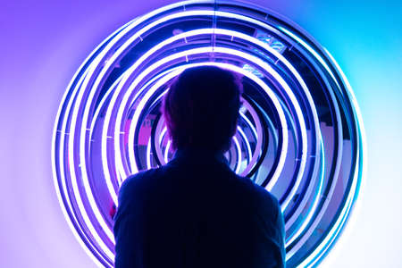 man inside virtual metaverse space, virtual gaming and augmented reality conceptの写真素材