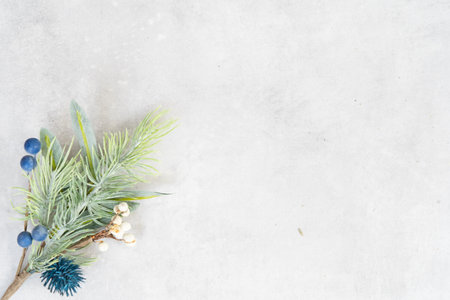 Cristmas silver and teal decorations over gray background, copy spaceの写真素材