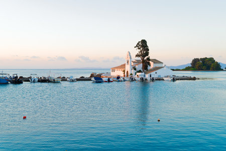 view of Vlacherna monastery island at sunrise, Kanoni, Corfu island Greeceの写真素材