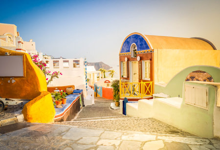 street of Oia town, view of traditional greek village of Santorini, Greece, tonedの写真素材