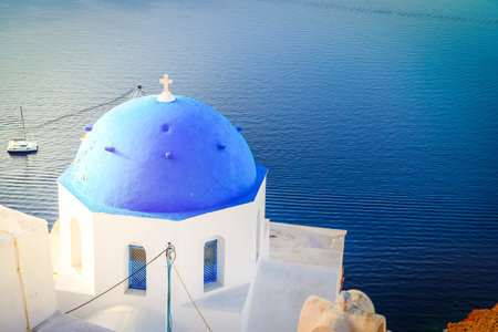 with blue domes of church, Greece, Santorini islandの写真素材