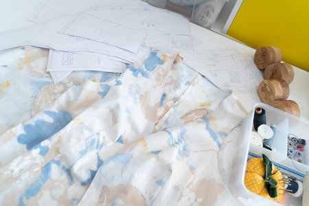 Sewing background with unfinished vest