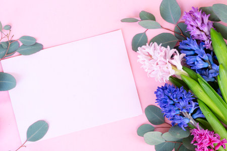 wedding or mothers day background, bouquet of Hyacinth flowers over plain pink background, top viewの写真素材
