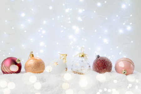 White christmas with snow - pink and golden decorations close upの写真素材