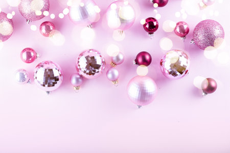 Christmas decorations on pink background, top viewの写真素材