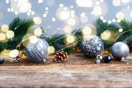 Elegant gray christmas scene on natural wood table backgroundの写真素材