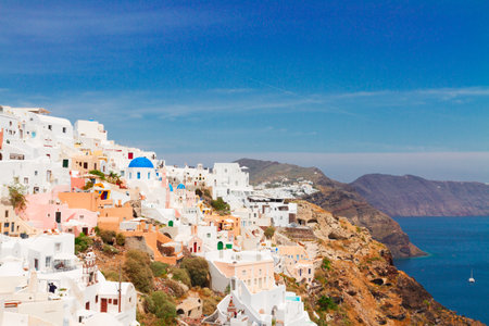 Oia, traditional greek white village townscape and caldera of volcano, Santorini, Greeceの写真素材