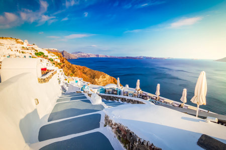 steps and blue waters of Aegan sea, beautiful details of Santorini island, Greeceの写真素材