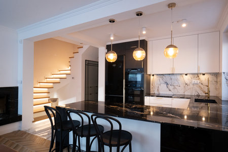 white and black modern kitchen room with bar counterの写真素材