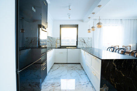 white and black modern kitchen room with bar counterの写真素材