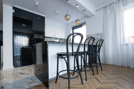 white and black modern kitchen room with bar counterの写真素材