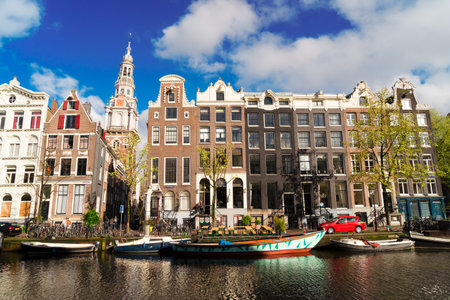 Facades of old historic Houses over canal water, Amsterdam, Netherlandsの写真素材