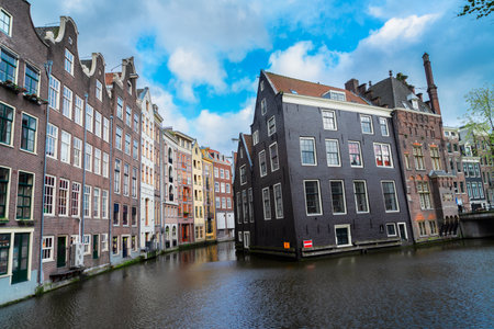 Facades of old histoic Houses over canal water, dutch scenery of Amsterdam, Netherlandsの写真素材