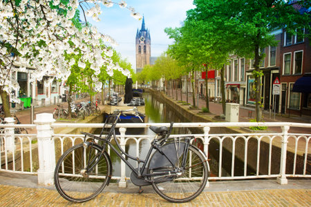Canal and Old Church falling tower of Delft at spring, Hollandの写真素材