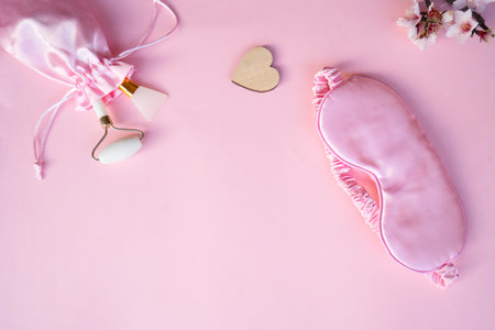 spring flowers with sleeping mask, sleep-wake disorders concept, insomnia therapy, sleep difficulties and deprivationの写真素材