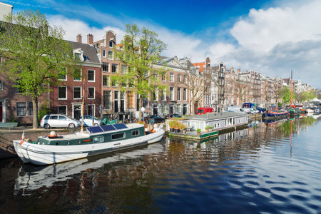 embankment of Amstel canal in Amsterdam at summer day, Netherlandsの写真素材