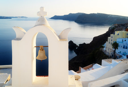 beautiful details of Santorini island, view of white church belfry close up and Oia summer landscape, Santorini Greeceの写真素材
