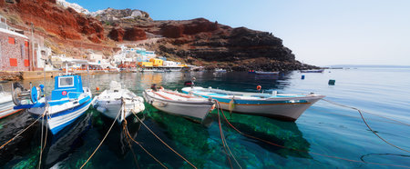 Amoudi bay with boats, port of Oia, Santorini Greece at sunny summer, web bannerの写真素材