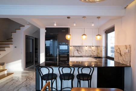 white and black modern kitchen room with bar counterの写真素材