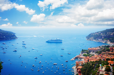 colorful coast and turquiose water with boats and ships, cote dAzur, France, retro tonedの写真素材