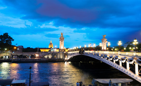 Paris at night - famouse Alexandre III Bridge illuminated at night, Paris, Franceの写真素材