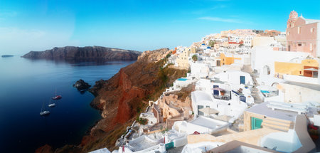 traditional greek village Oia of Santorini, street against deep Aegan sea and caldera, Greece, web banner formatの写真素材