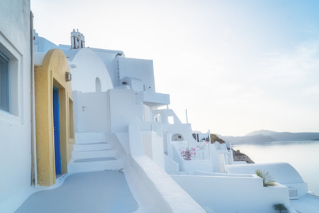 traditional greek village Oia of Santorini, street against Aegan sea and caldera, Greeceの写真素材