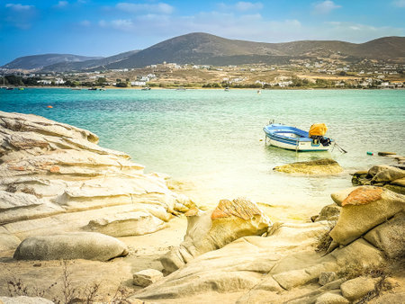 Romantic beach with rocks at greek island, Paros Greece with sunshine, panorama web formatの写真素材
