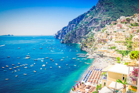 summer Thyrenian sea and beach of Positano from above - famous old italian resort, Italy, toned imageの写真素材