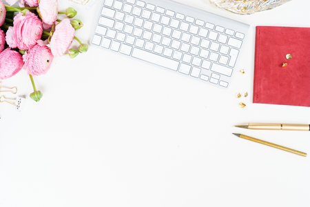 Flat lay home office workspace, copy space on white backgroundの写真素材