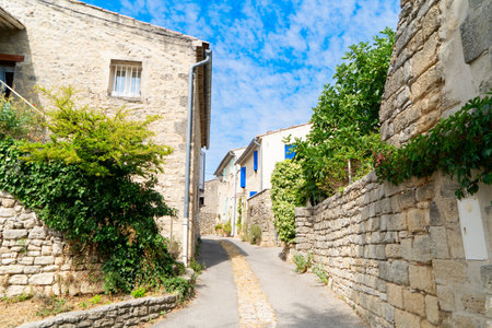 beautiful old towncosy street with stairs of Provence at summer day, Franceの写真素材