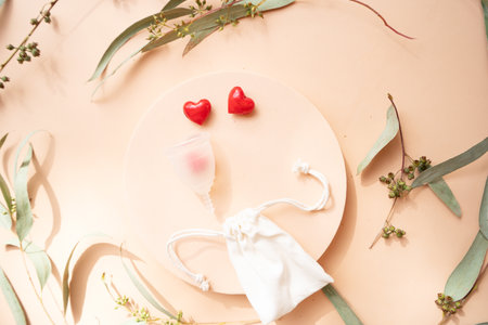 Menstrual cup over violet background, eco friendly and zero waste solutionの写真素材
