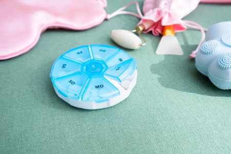 pill box with sleeping mask and pill box, sleep-wake disorders concept, insomnia therapy, sleep difficulties and deprivationの写真素材