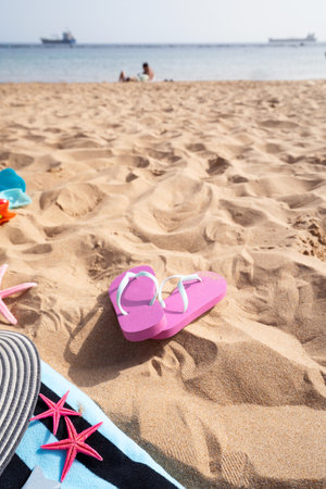 Summer beach still life background with copy space on sandの写真素材
