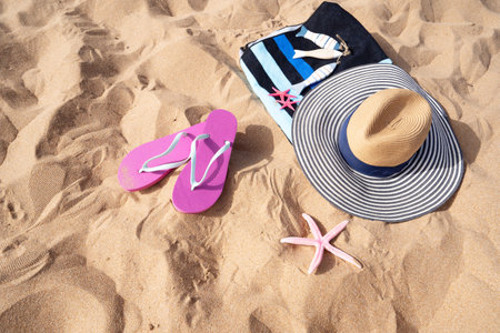 Summer beach still life background with copy space on sandの写真素材