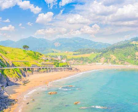 Cantabrian Sea green coast with Deba town, Pais Vasco Spainの写真素材
