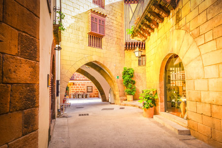 Poble Espanyol stone pedestrian small street, traditional architecture site in Barcelona, Catalonia Spainの写真素材