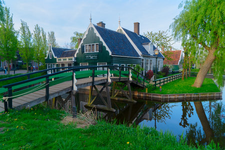 rural dutch country scenery of houses in small old town Zaanse Schans, Netherlandsの写真素材