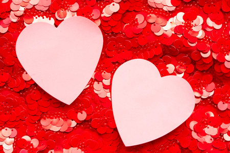 Valentines day festive background with two pink hearts