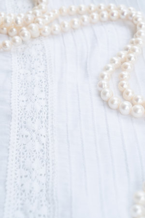 Pearl jewelery styled stock scene, for wedding invitation, product showcase or styled presentation with copy space on greeting card, top viewの写真素材