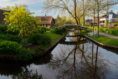 rural dutch traditional country small old town Giethoorn with canals, Netherlandsの写真素材