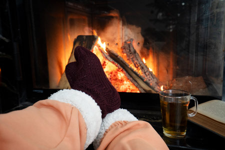 The warmth and comfort created by the glowing fire is simply perfect for enjoying a relaxing evening indoorsの写真素材
