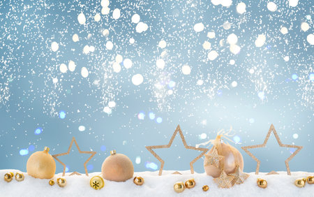 Christmas extra wide border with stars and golden balls on blue snow backgroundの写真素材