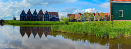 rural dutch country street of small old town Volendam, Netherlandsの写真素材