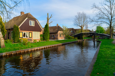 rural dutch traditional country small old town Giethoorn with canals, Netherlands sceneryの写真素材