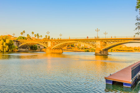 Triana Bridge, the oldest bridge of Seville, Spainの写真素材