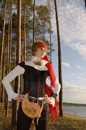 Pirate girl on a beachの写真素材